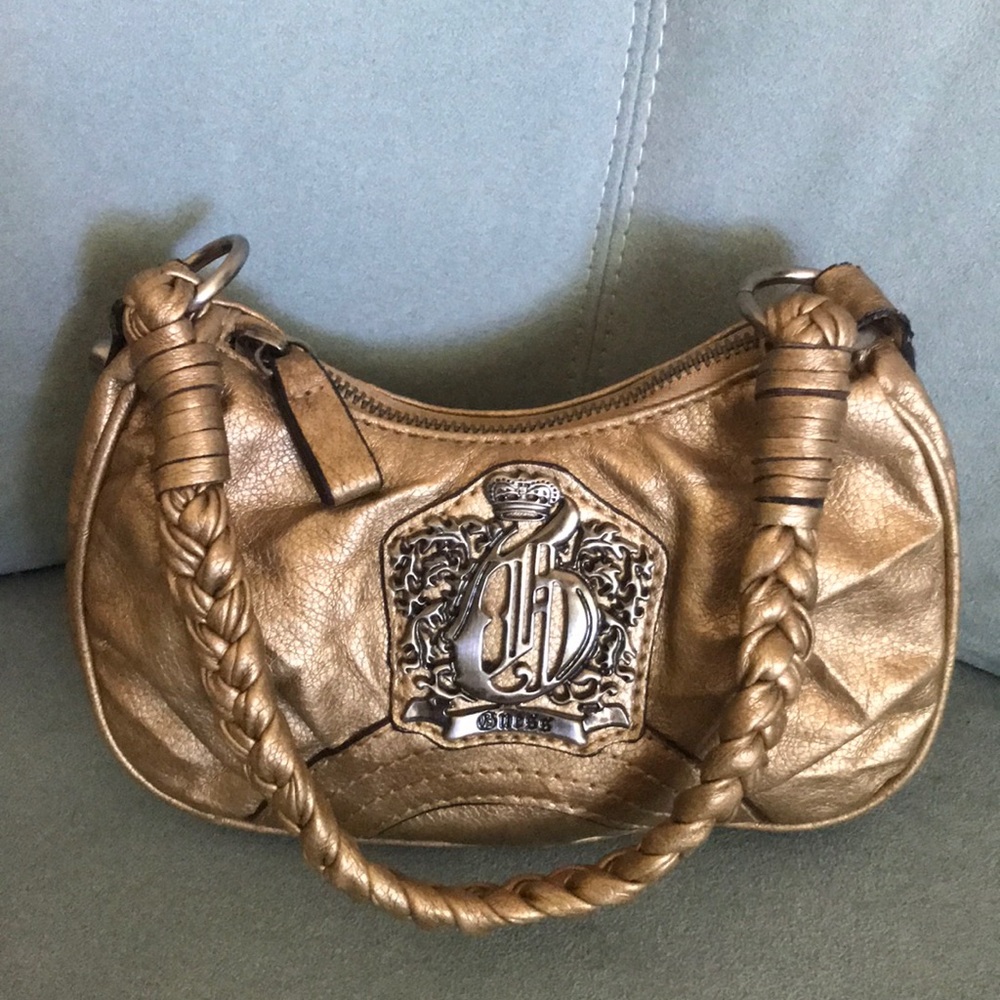 GUESS “Corona Mini” crown gold metallic purse